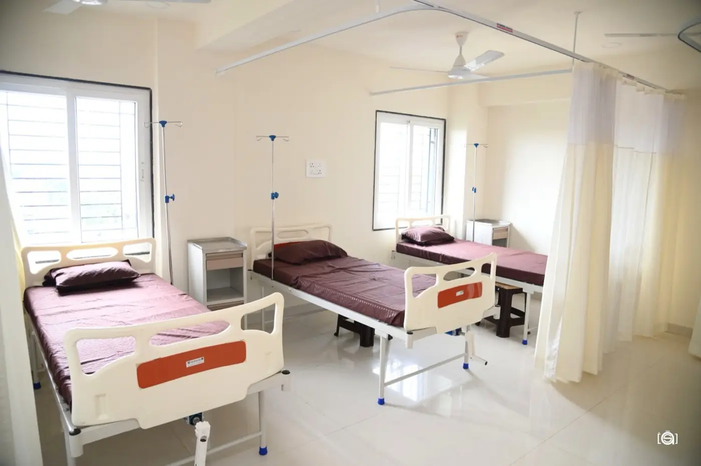 In-patient ward with hospital beds at Aansh Hospital & IVF Center